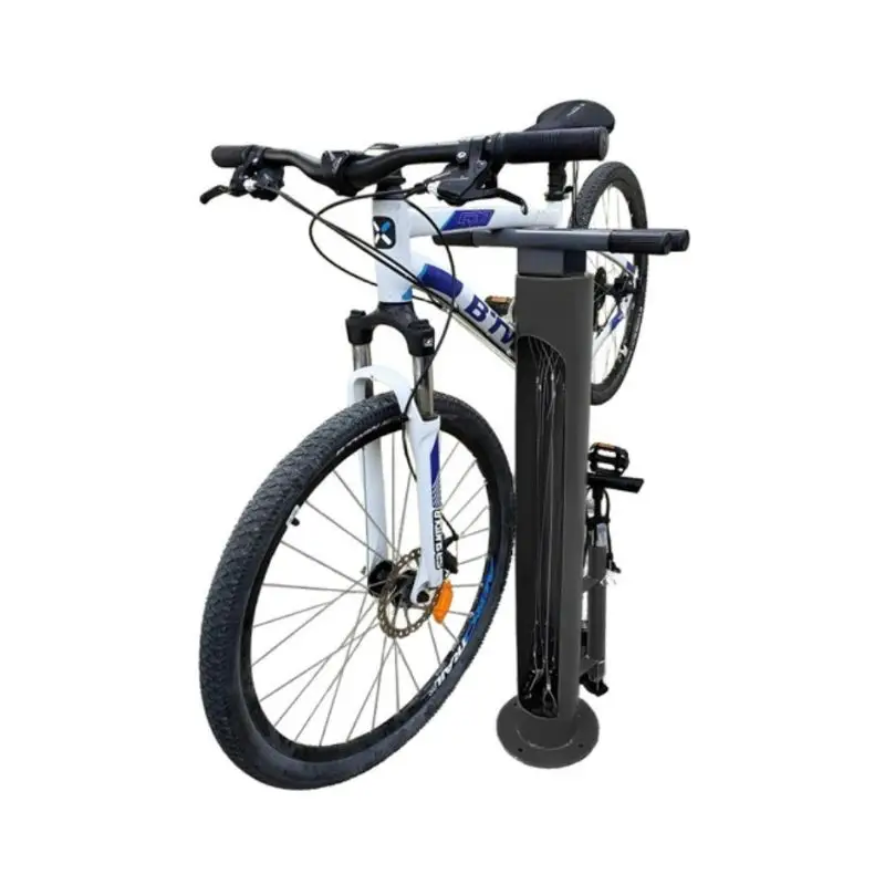 VTT blanc accroché à une borne de stationnement vélo noire